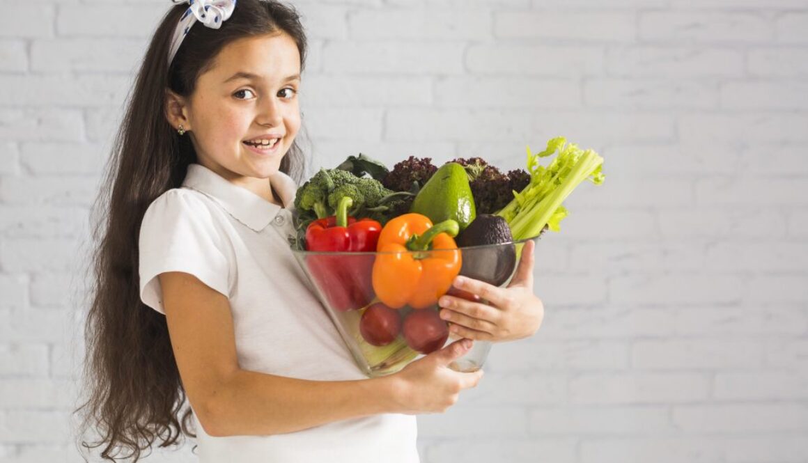 girl-holding-ripe-banana-citrus-lemon